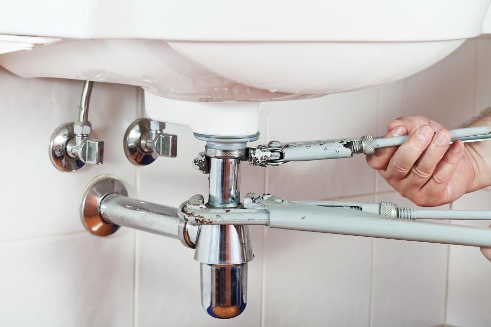 Réparer le siphon évier